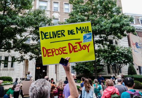 protest held outside postmaster general louis dejoy's dc home