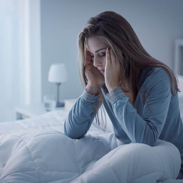 depressed woman awake in the night