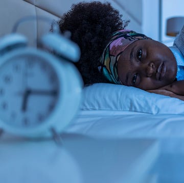 Depressed young woman lying in bed and feeeling upset after quarrel with her boylfriend in bed at home depressed young woman lying in bed and feeeling upset after quarrel with her boylfriend in bed at home