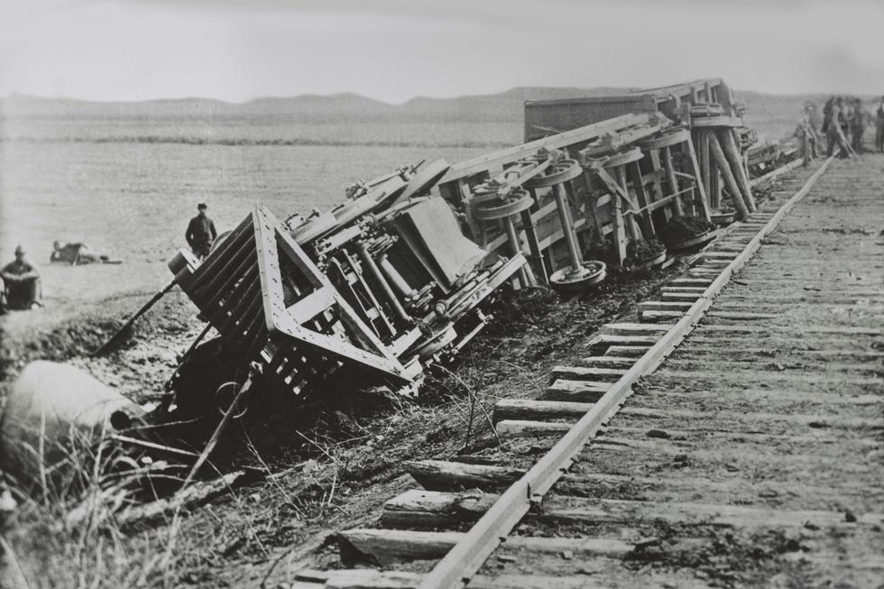 Derailed Train during American Civil War, Manassas, Virginia, early 1860's derailed train lies on its side next to train tracks