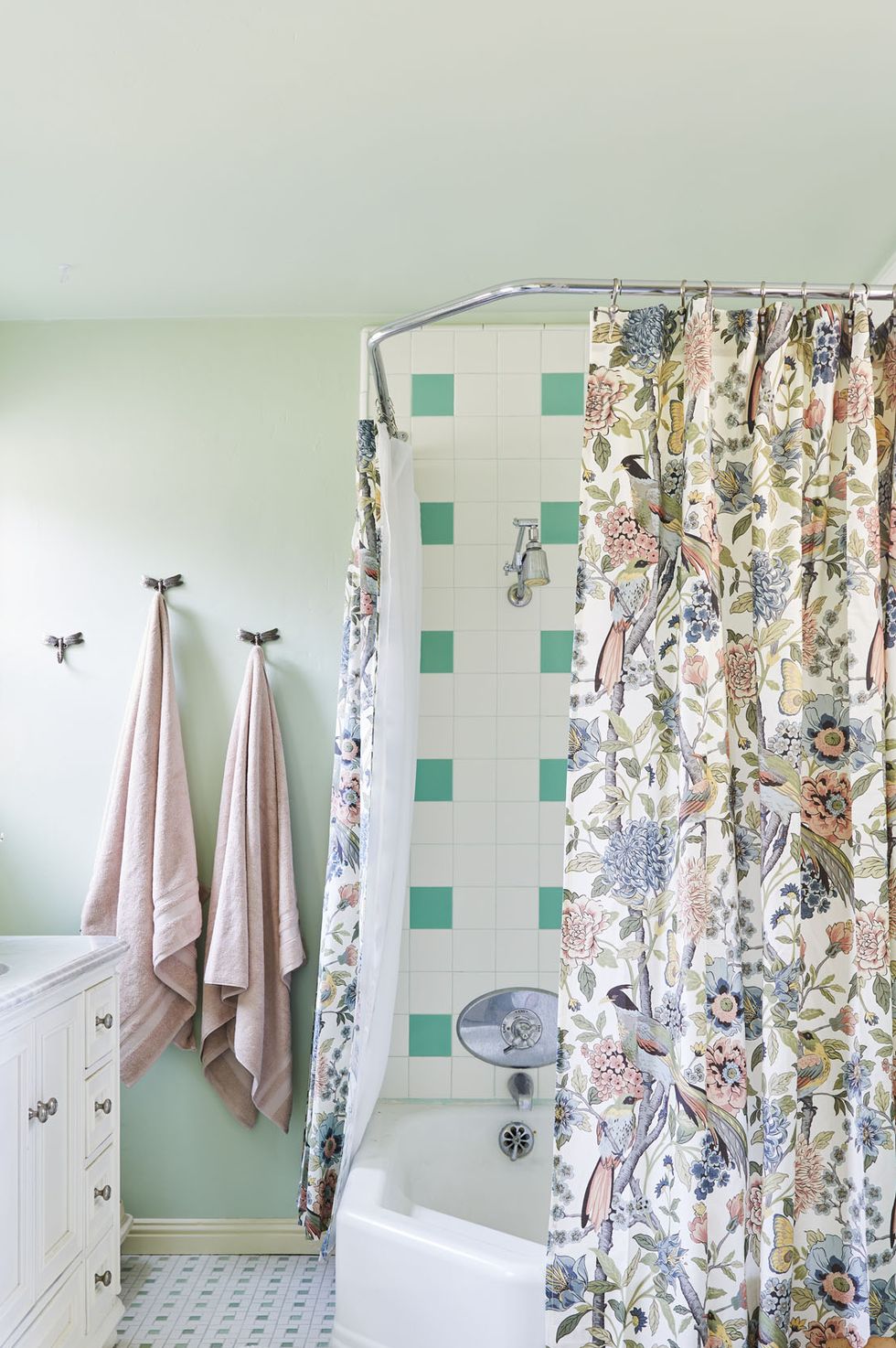 Bathroom with floral curtains
