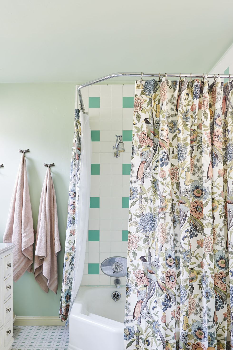 bathroom with floral curtain