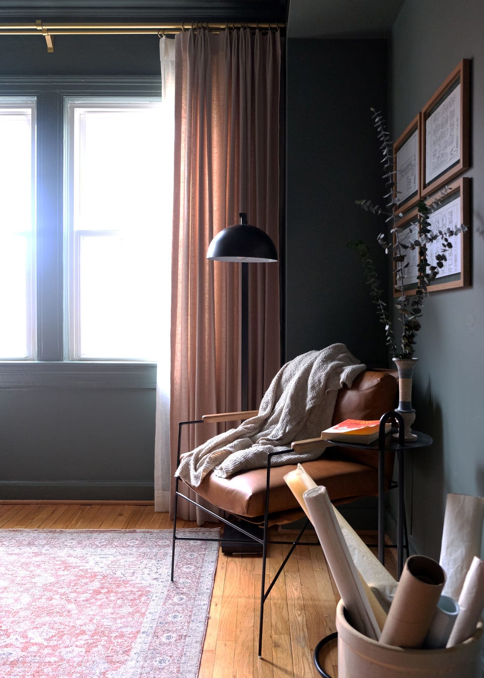 cozy reading nook with a chair lamp and decorative elements