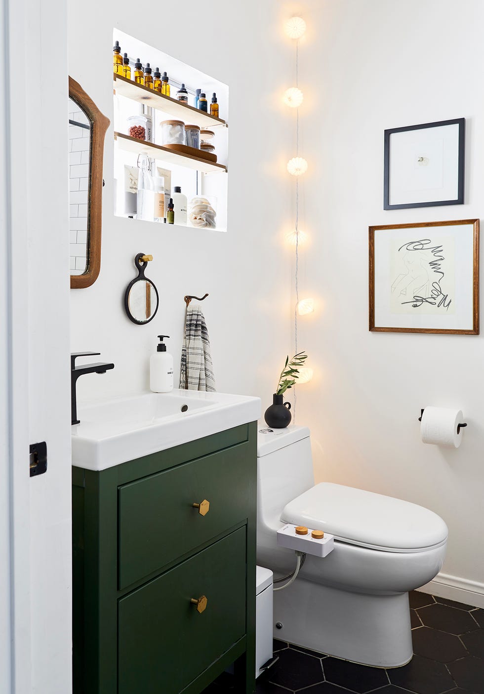 a bathroom with a toilet and a sink