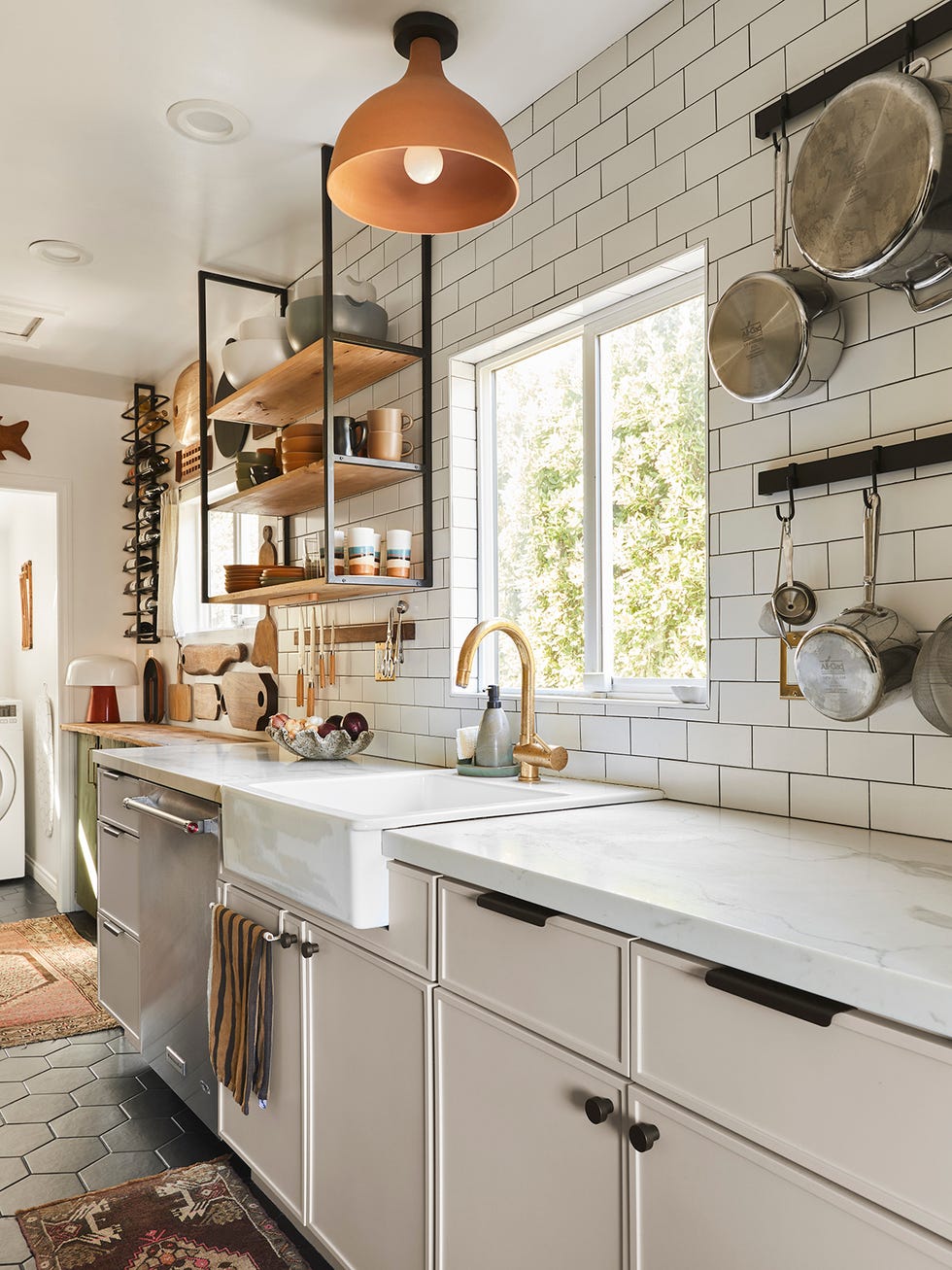 galley kitchen with storage on the walls