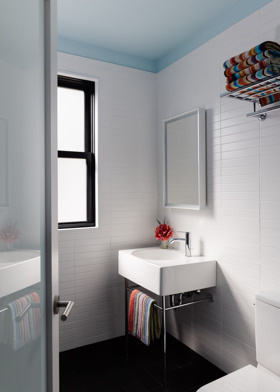 white bathroom with blue ceiling