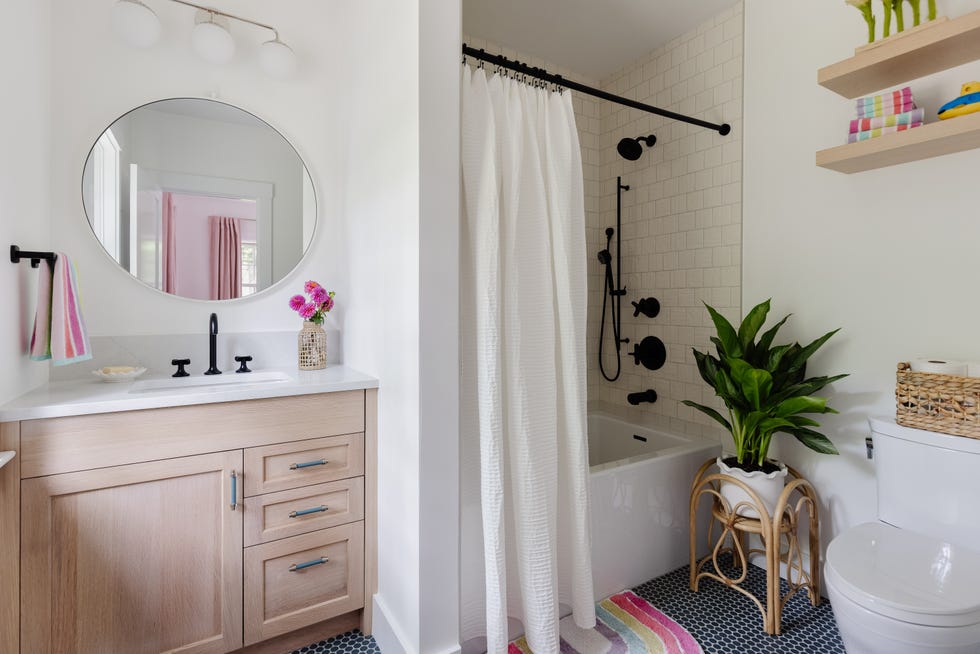 white bathroom with pops of color