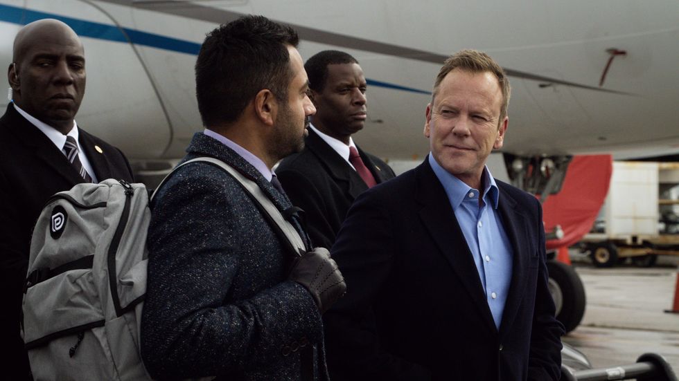 seth wright and tom kirkman smile at each other on the airport runway in  designated survivor season 3