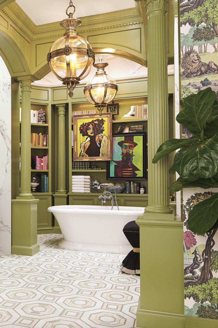 green and white bathroom surrounded by a library