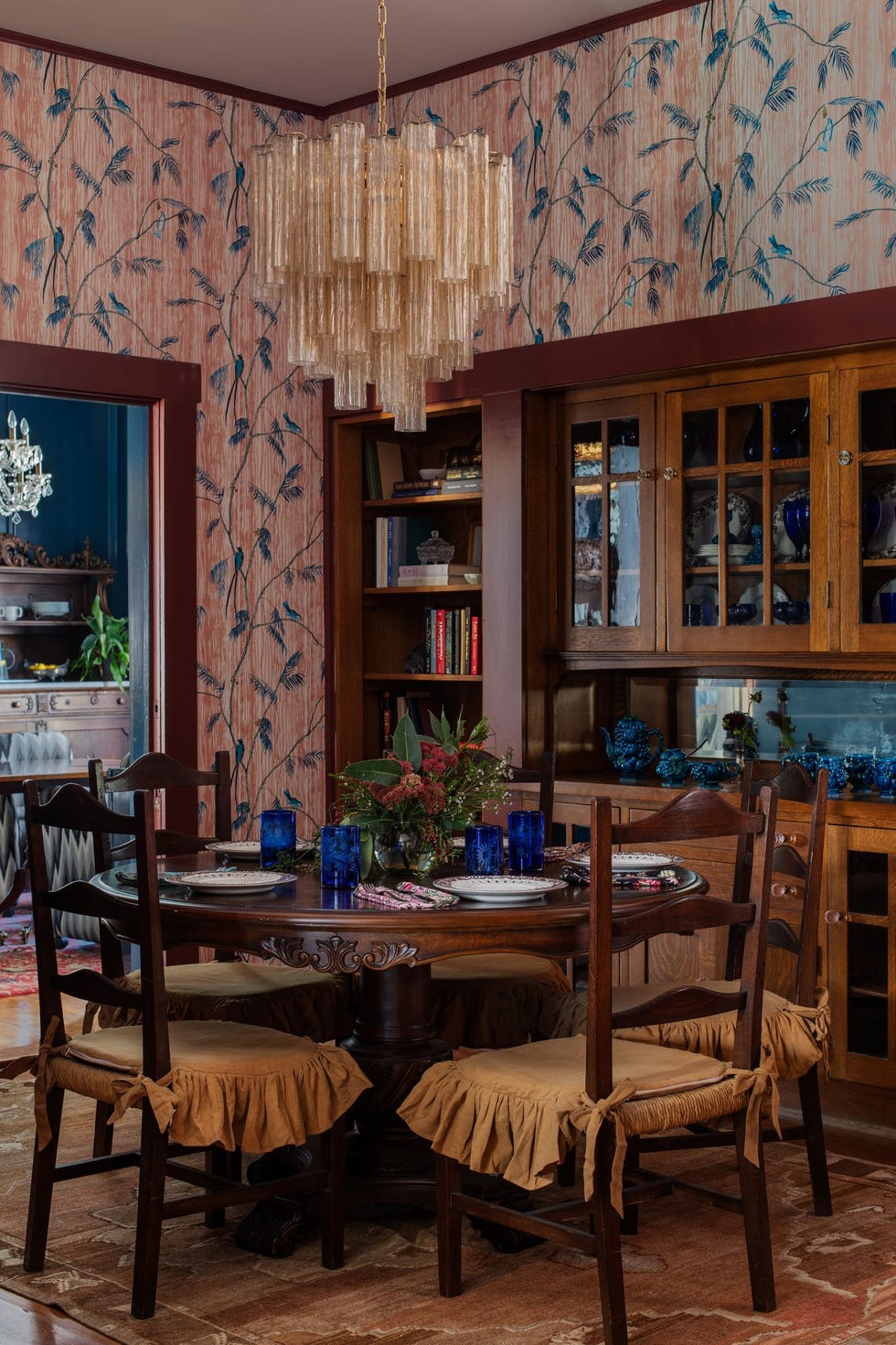 a dining room table with chairs