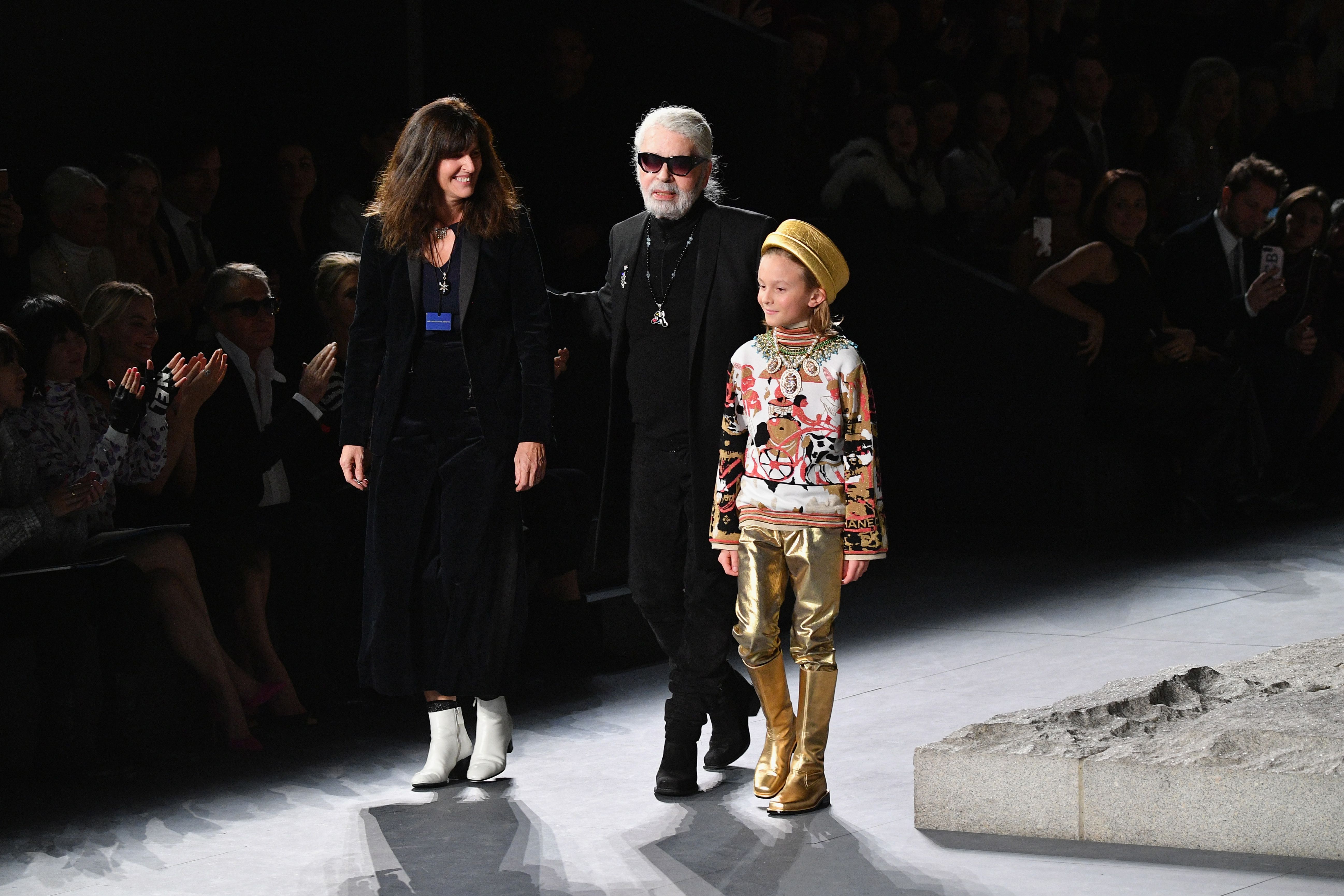 Fashion designer Karl Lagerfeld, who helped grow Chanel brand, has