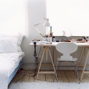 white chair in bedroom