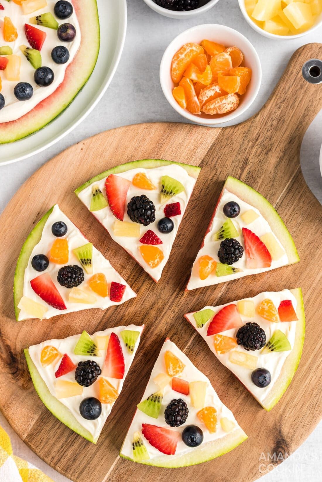 Tasty sweet pizza with berries, marshmallows and candies in