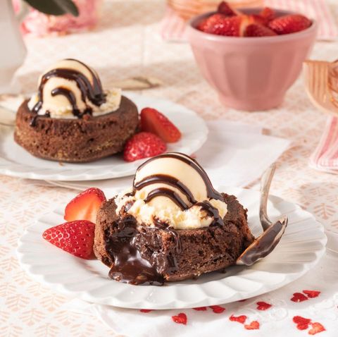chocolate lava cakes with ice cream and strawberries