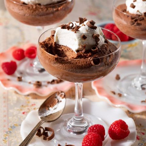chocolate mousse with whipped cream in martini glass