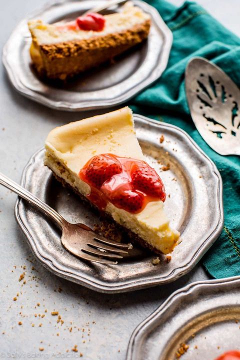 small batch cheesecake slice on plate with strawberries