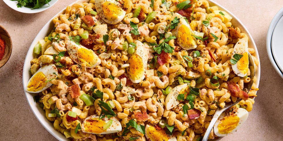 the perfect fuss free solution for deviled egg lovers this deviled egg pasta salad has tender elbow macaroni noodles and crispy bacon combined with garlic powder and sweet paprika seasoned mayonnaise dijon dressing, then tossed with celery, scallions, and parsley for mild onion flavor and a slight crunch