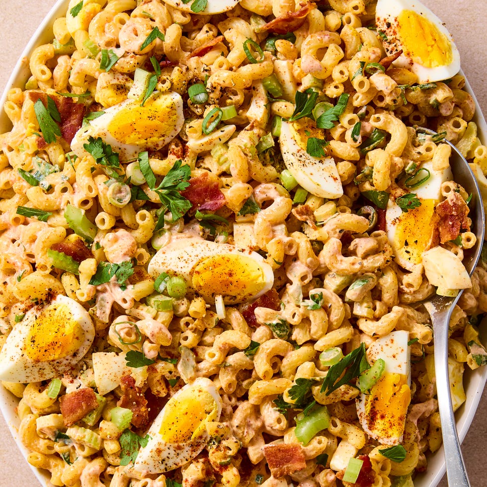 the perfect fuss free solution for deviled egg lovers this deviled egg pasta salad has tender elbow macaroni noodles and crispy bacon combined with garlic powder and sweet paprika seasoned mayonnaise dijon dressing, then tossed with celery, scallions, and parsley for mild onion flavor and a slight crunch