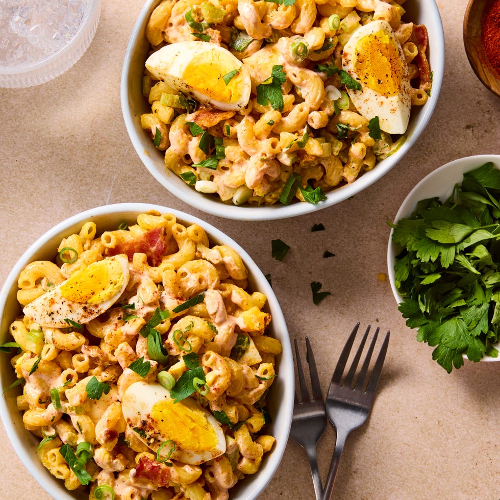 the perfect fuss free solution for deviled egg lovers this deviled egg pasta salad has tender elbow macaroni noodles and crispy bacon combined with garlic powder and sweet paprika seasoned mayonnaise dijon dressing, then tossed with celery, scallions, and parsley for mild onion flavor and a slight crunch