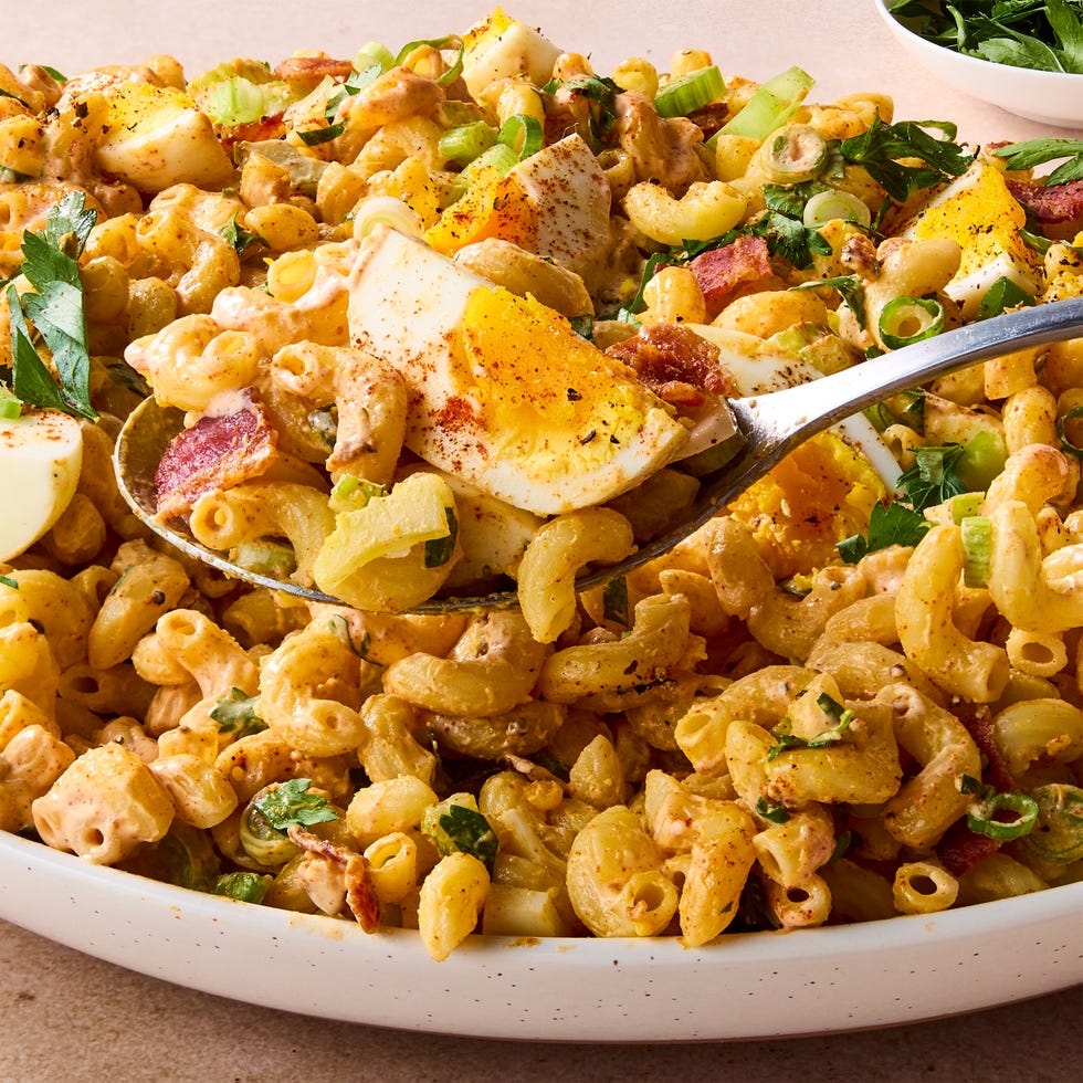 the perfect fuss free solution for deviled egg lovers this deviled egg pasta salad has tender elbow macaroni noodles and crispy bacon combined with garlic powder and sweet paprika seasoned mayonnaise dijon dressing, then tossed with celery, scallions, and parsley for mild onion flavor and a slight crunch