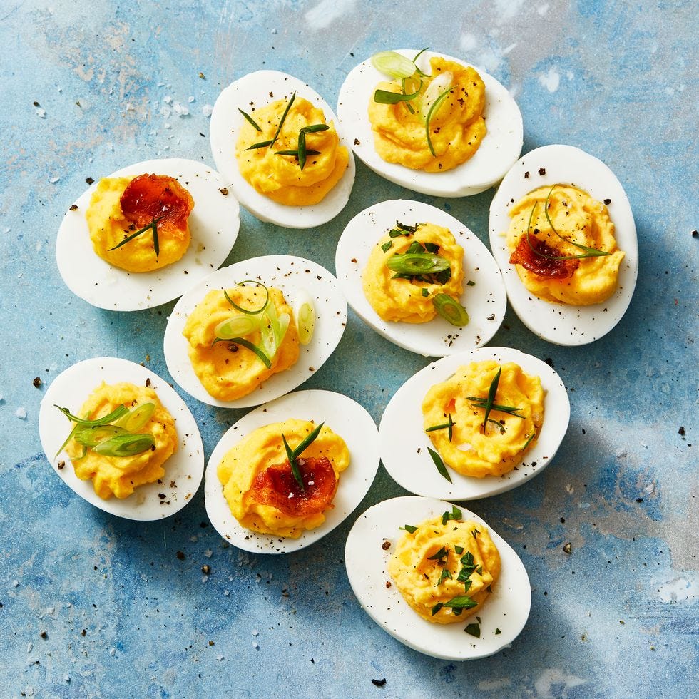 deviled eggs with fresh chives sprinkled on top