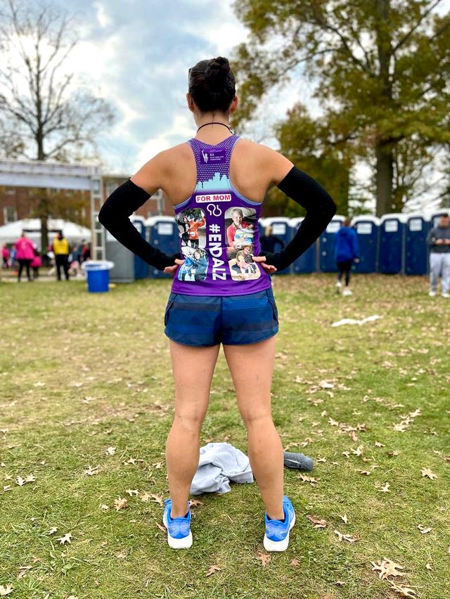 participant wearing a custom athletic outfit with a message how running changed me devon pass runner's world magazine