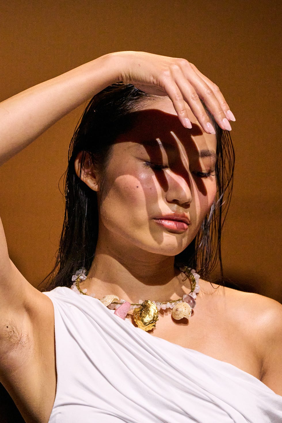 Model showcasing jewelry and fashion design