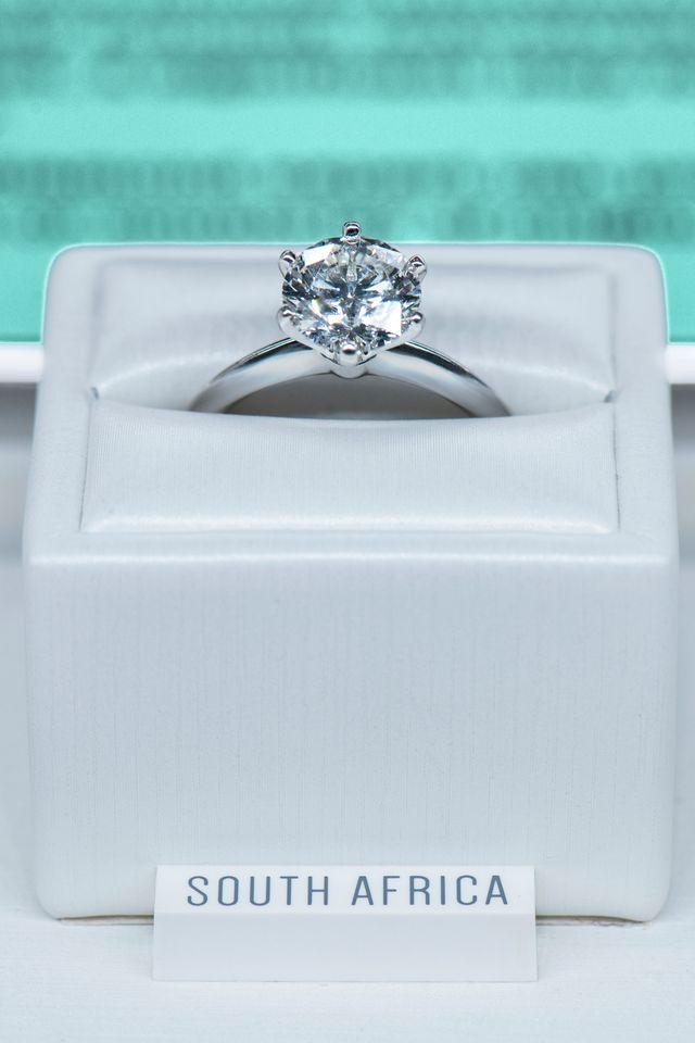 Engagement ring, Ring, Fashion accessory, Jewellery, Diamond, Platinum, Wedding ring, Rectangle, Wedding ceremony supply, Gemstone, 