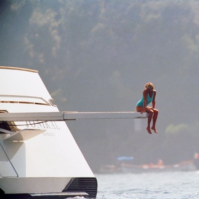 diana on yacht diving board