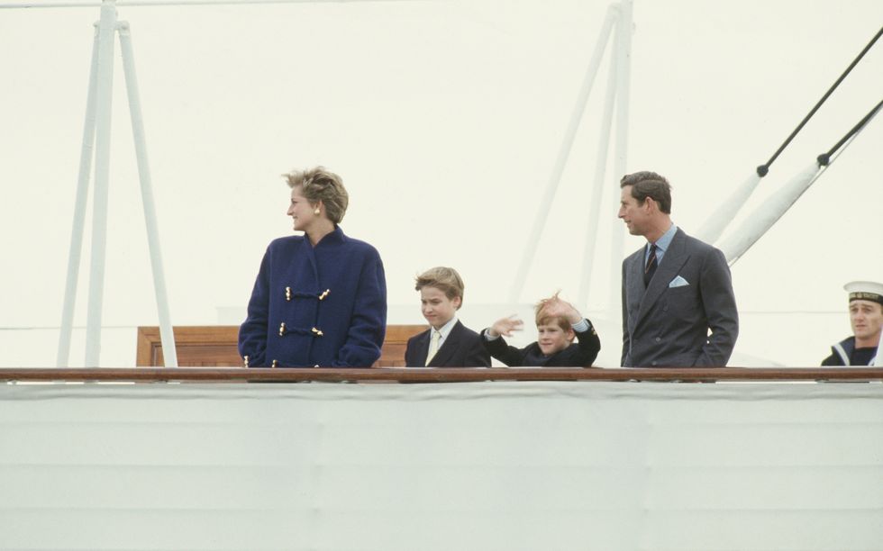 princess diana, prince william, prince harry, and prince charles on the deck of the royal yacht