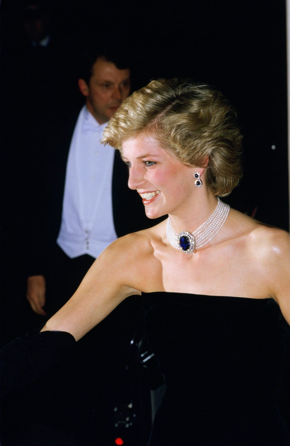 Diana, Princess of Wales arrives for a banquet at Ho's mansion