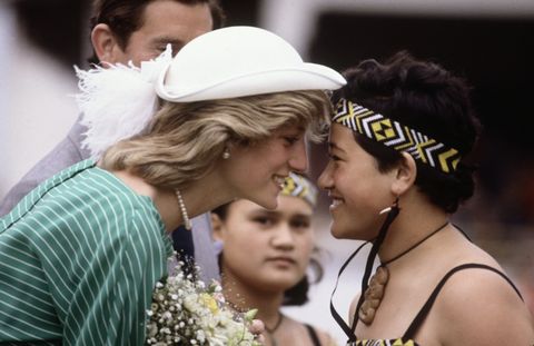 Diana Princess of Wales is given the traditional Maori greeting of a nose rub
