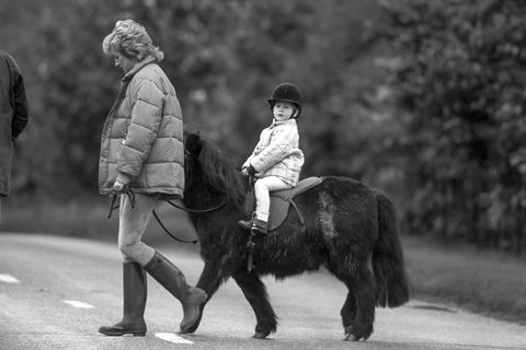 Diana, Princess of Wales, takes Prince Harry out on his Pony