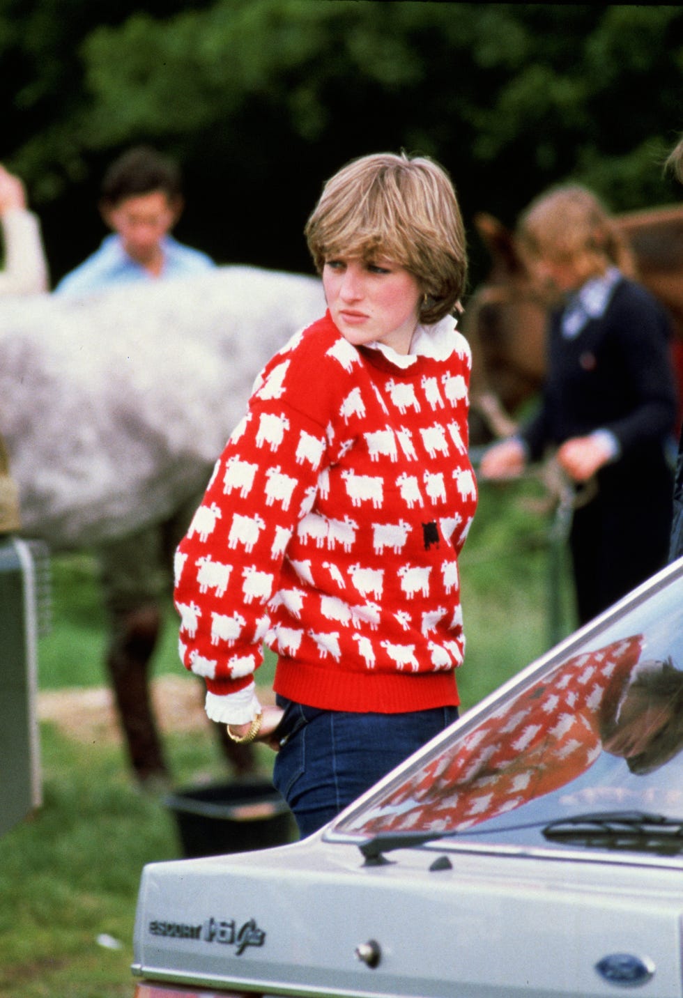 diana, princess of wales wearing black sheep jumper