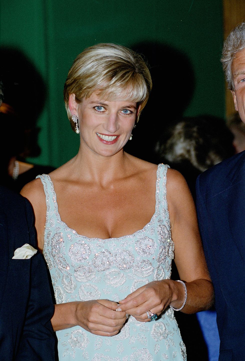 Diana, Princess of Wales wears an embroidered cocktail dress