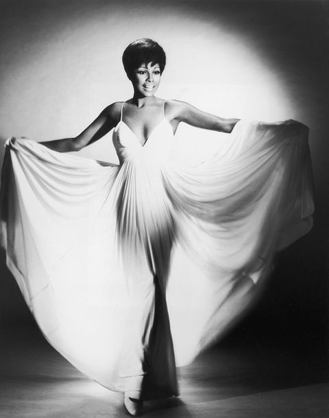 circa 1960  a full length studio portrait of american actor diahann carroll, fanning her long white dress with her arms  photo by hulton archivegetty images