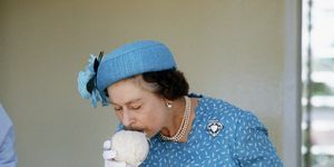 tuvalu   october 27  the queen drinking from a coconut  photo by tim graham photo library via getty images