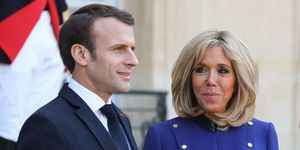 topshot   french president emmanuel macron l and his wife brigitte macron look on after accompanying back the chinese president and his wife following a meeting at the elysee palace in paris, on march 26, 2019, at the end of a state visit   the chinese president is on a  three day state visit to france where he is expected to sign a series of bilateral and economic deals on energy, the food industry, transport and other sectors photo by ludovic marin  afp        photo credit should read ludovic marinafp via getty images