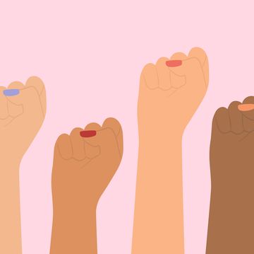 different nationalities of women raised fist feminist movement, independence, gender equality, protest and female empowerment concept