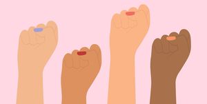 different nationalities of women raised fist feminist movement, independence, gender equality, protest and female empowerment concept