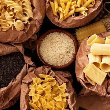 different types of dry pasta and rice in recycling bags