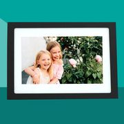 digital photo frame displaying photo of two blonde girls