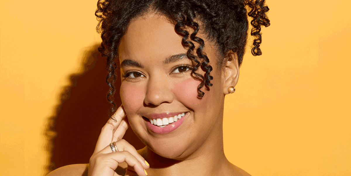 model with black curls and summer makeup model with black curls and summer makeup