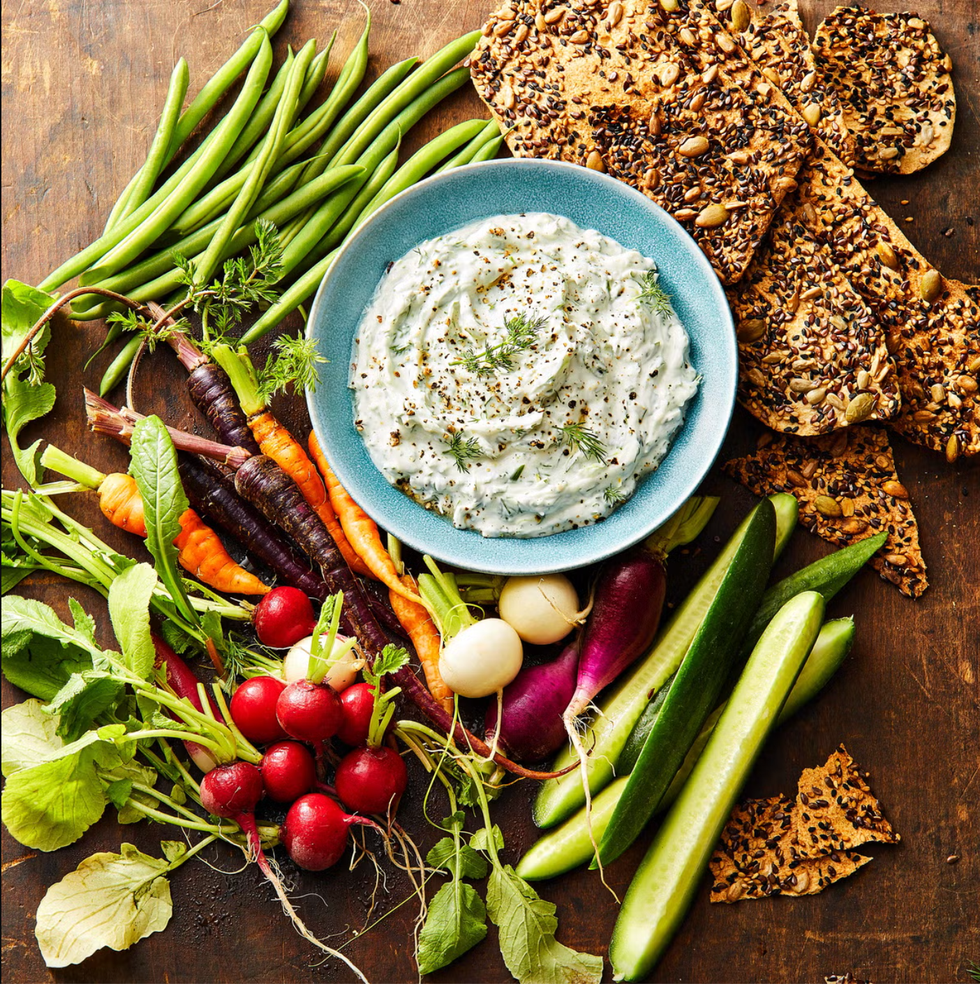 dill dip with veggies and crackers