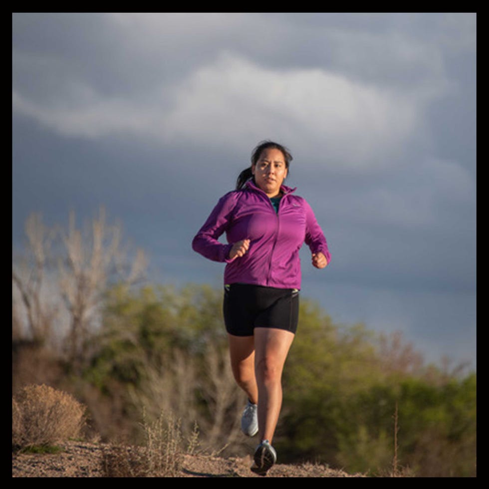 dinée dorame running on a trail