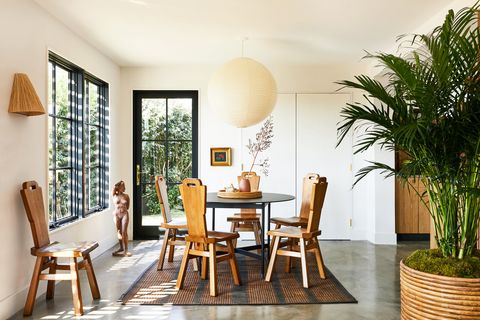 neutral california dining room with paper shade