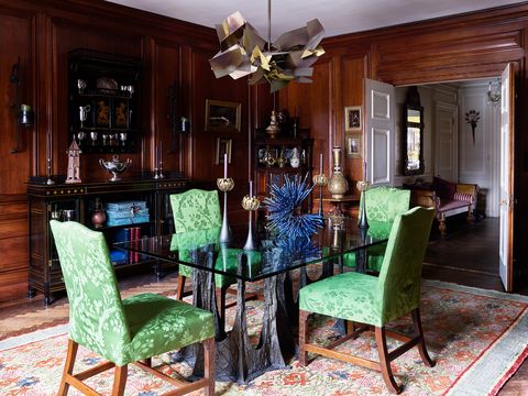 formal dining room with green chairs