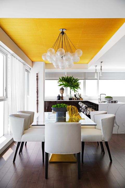 dinning room with yellow ceiling