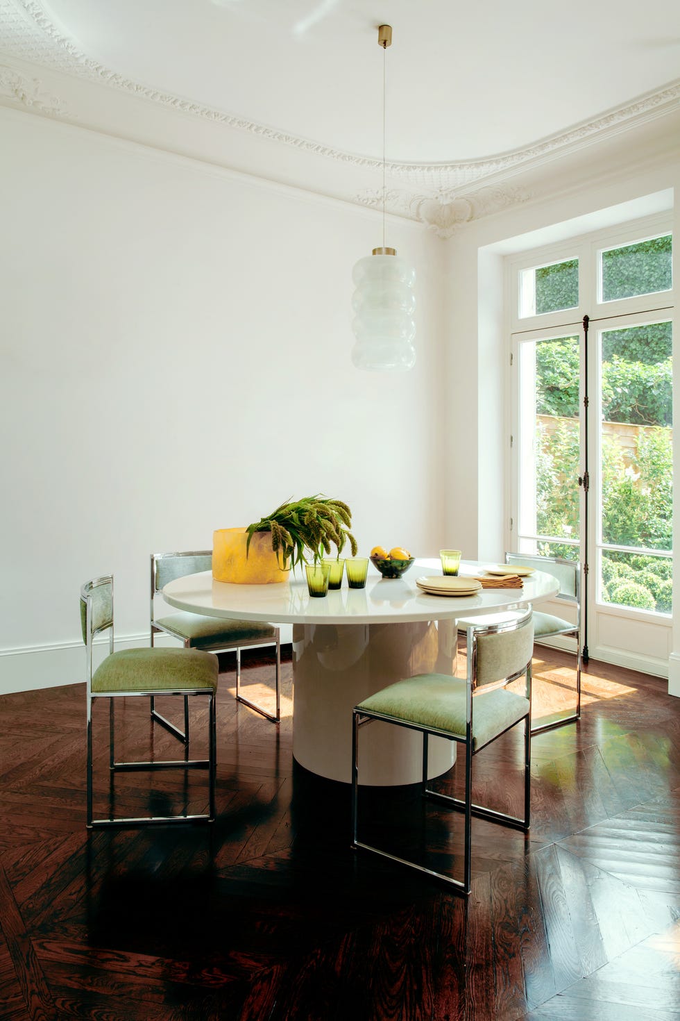 dining room in a paris apartment by studio rmgb