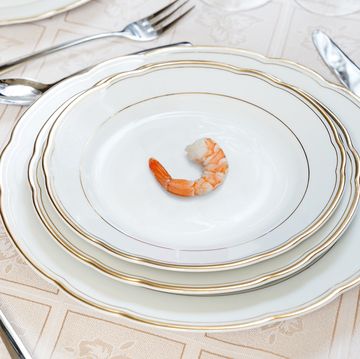 a plate with a carrot on it